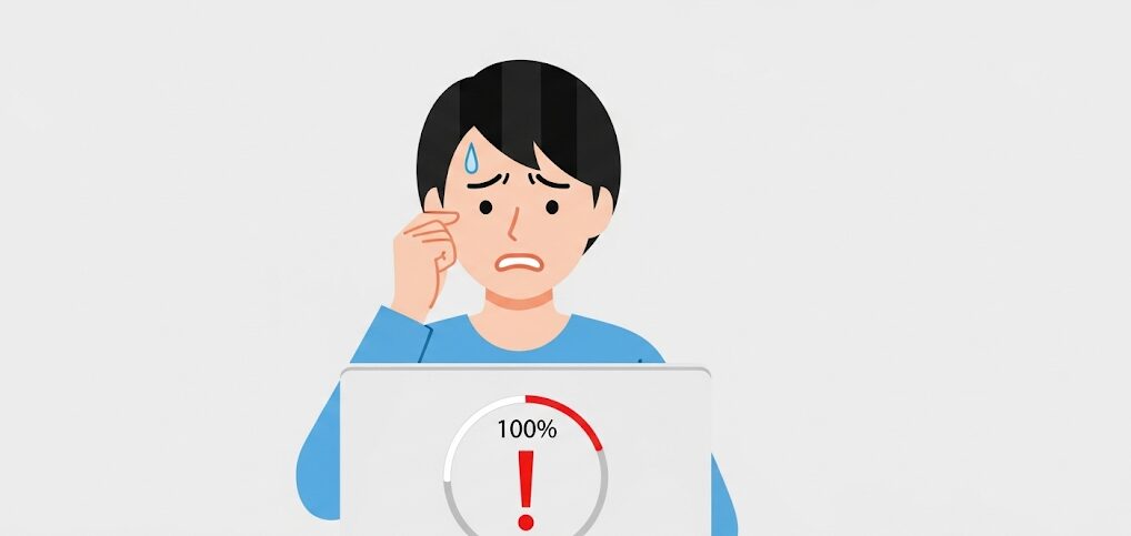 PCのディスク使用率が100%になり困っている日本人男性のフラットイラスト。PCディスク100問題の典型的な状況を表現。